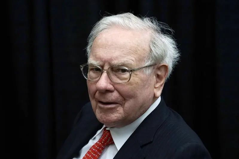 A picture of Warren Buffett looking towards the camera