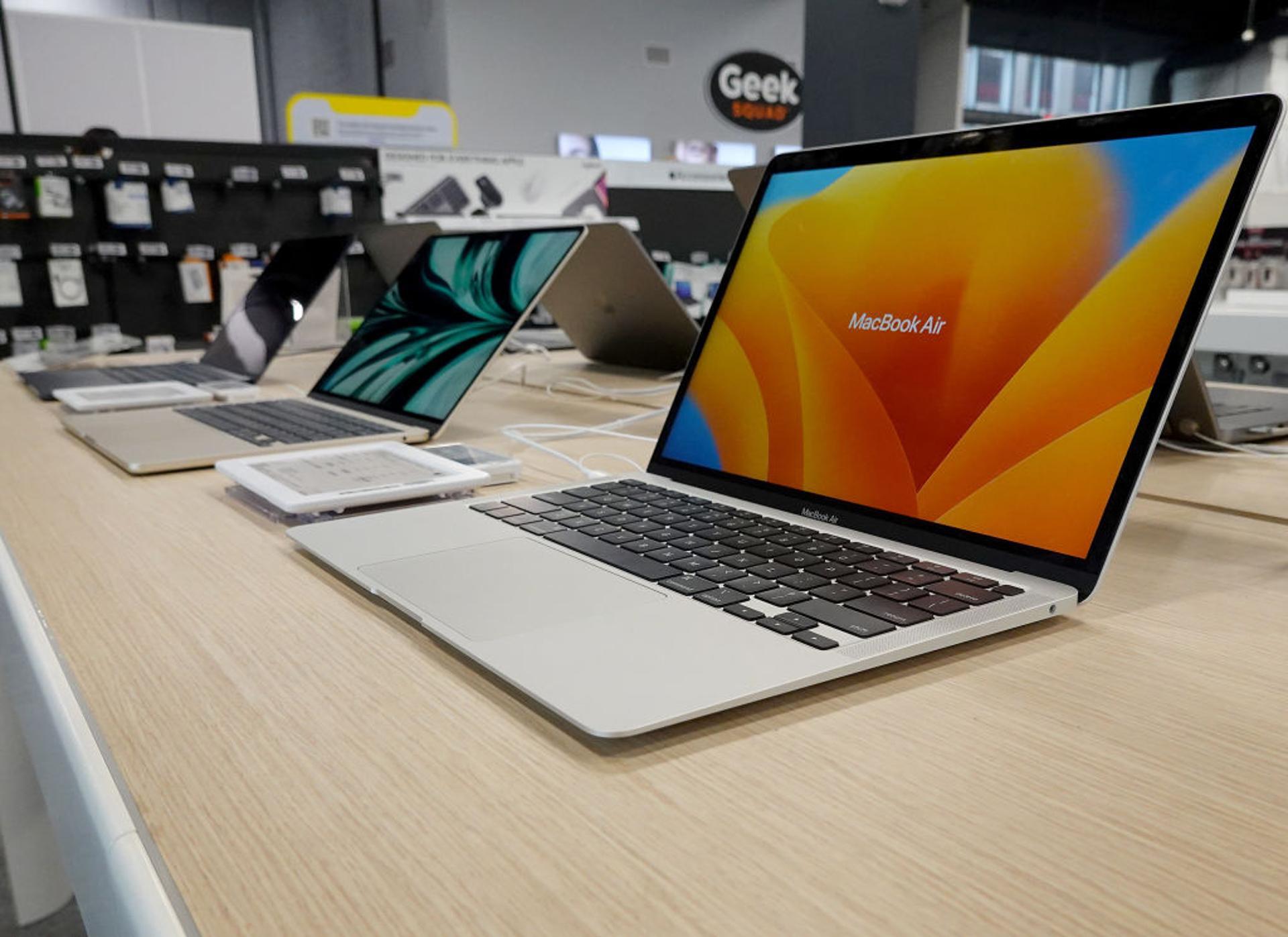 Apple computers sit on display in an electronics store on April 11, 2023, in Miami, Florida