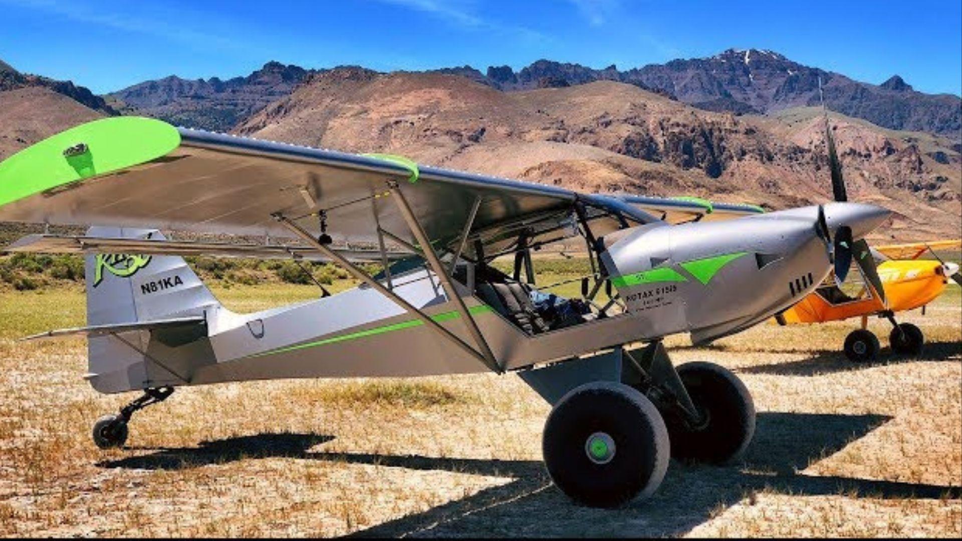 Silver and green Kitfox aircraft