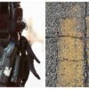A police officers tool belt is pictured next to cracked lines on a California State Route.