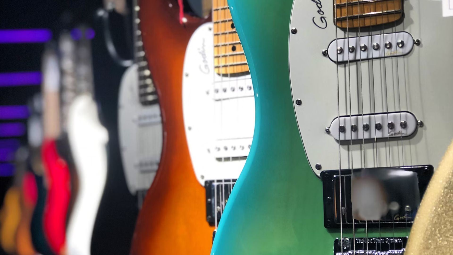 Guitars Lined on Wall