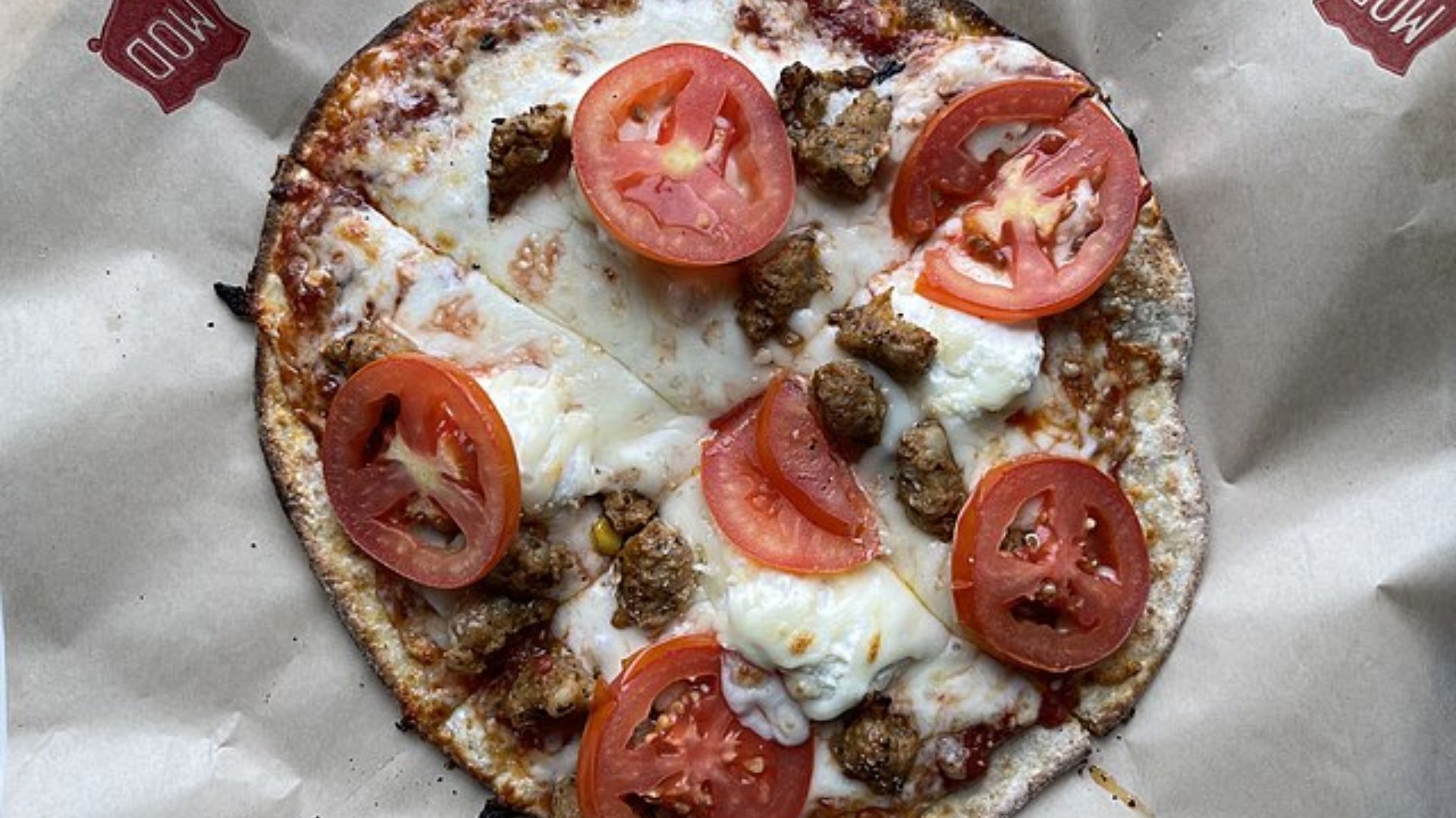 Cheese and Tomato Mod Pizza Cut Into Fourths