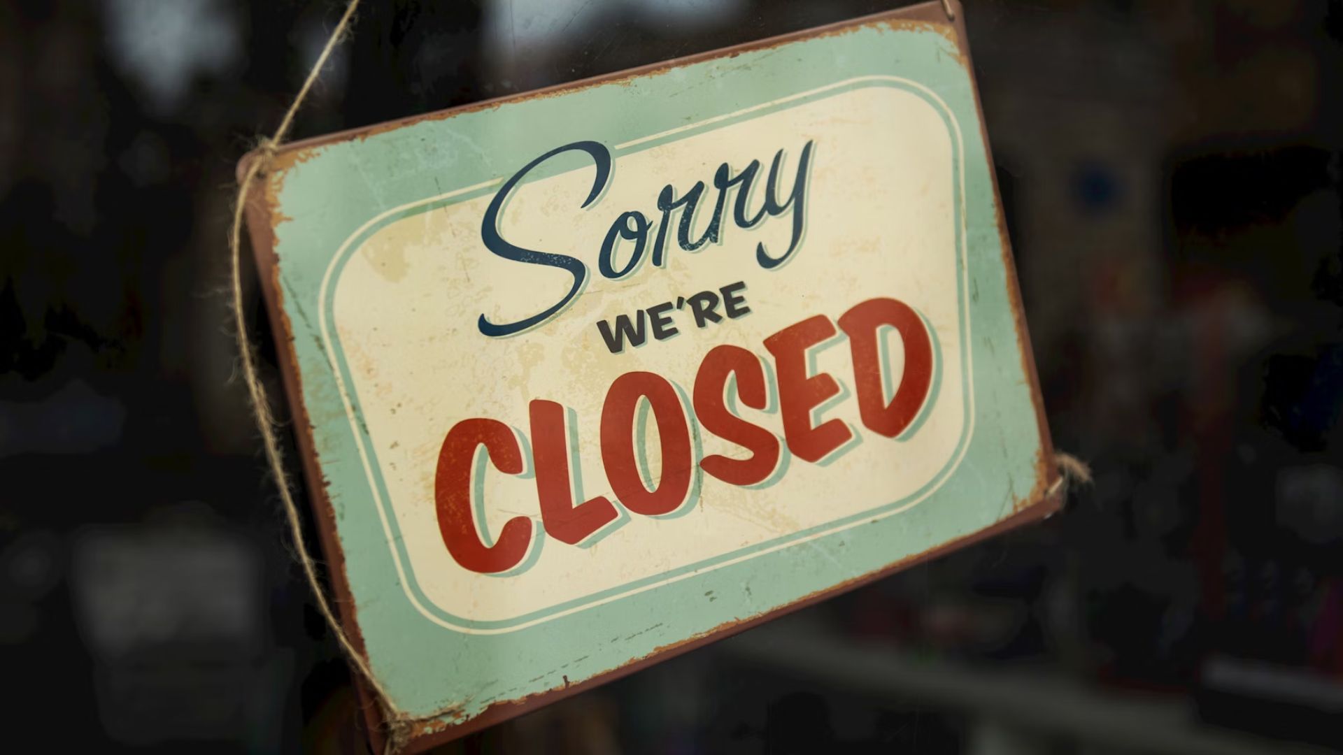 "Sorry We're Closed" Sign on Door